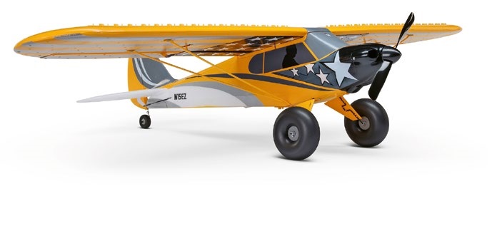 A yellow and black HobbyZone Carbon Cub S 2 model airplane with a propeller and landing gear.