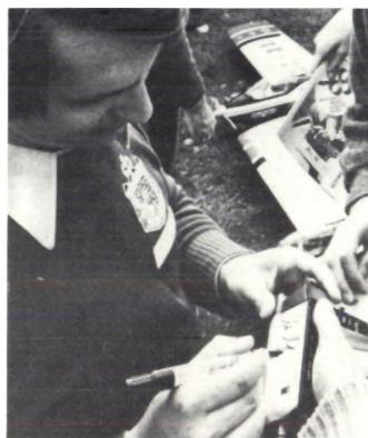 Wolfgang Matt signing autographs.