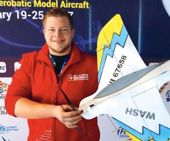 Arnaud CARRARD, Pilot F3P-A et F3P-AFM, holding a model aircraft.